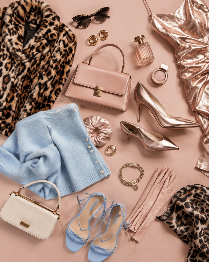 Rose-gold editorial flat-lay of contrasting fashion aesthetics, leopard pastel metallics, blush cream tones, clean studio, no text