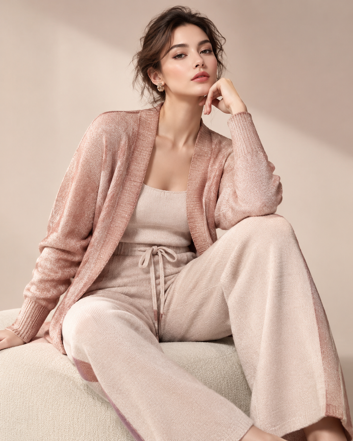 Woman in soft rose-gold comfortable knit co-ord, relaxed yet polished studio editorial